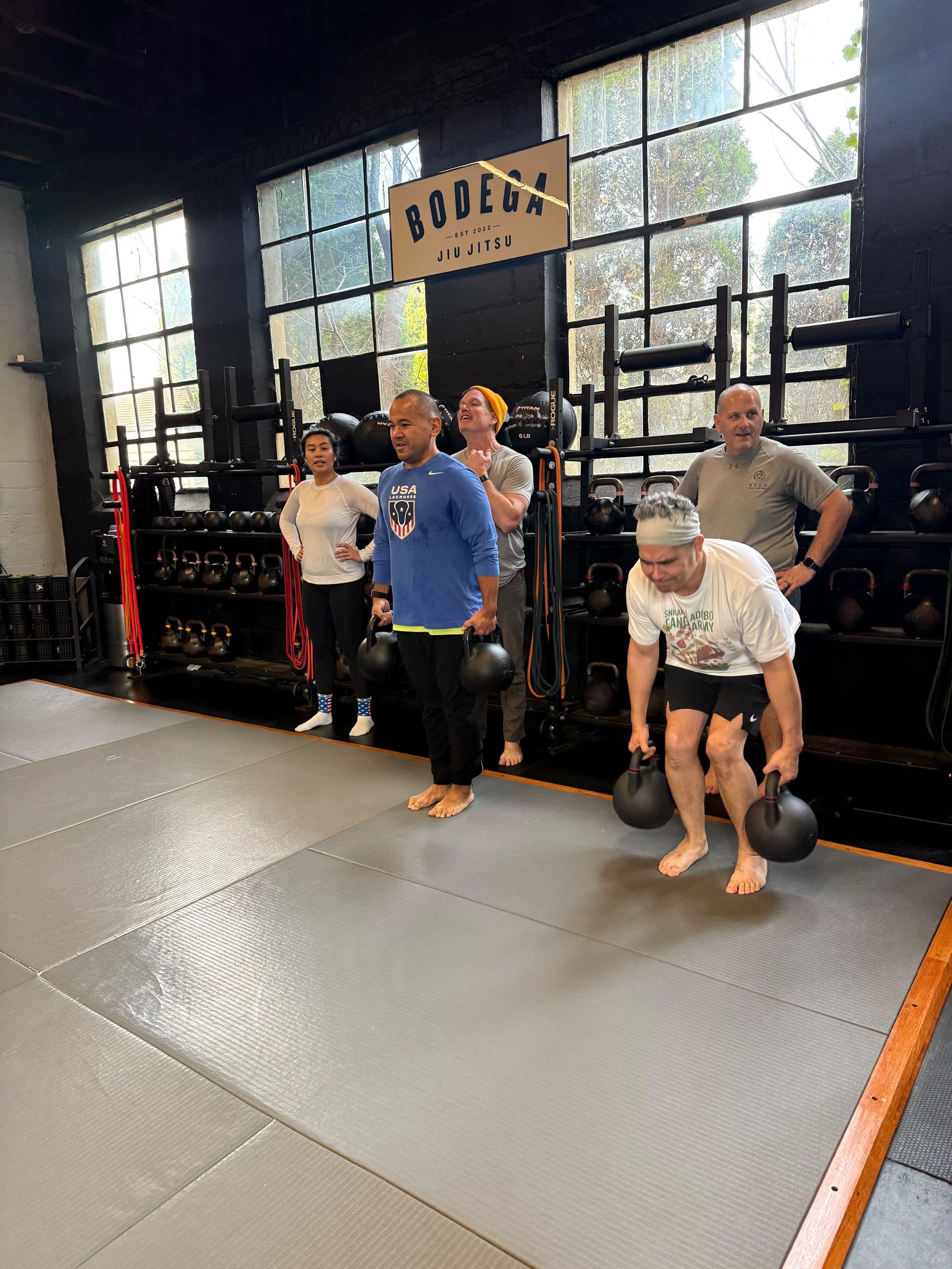 Small group training during Fitness Classes at Soma MVMT in Maplewood, NJ, building strength.