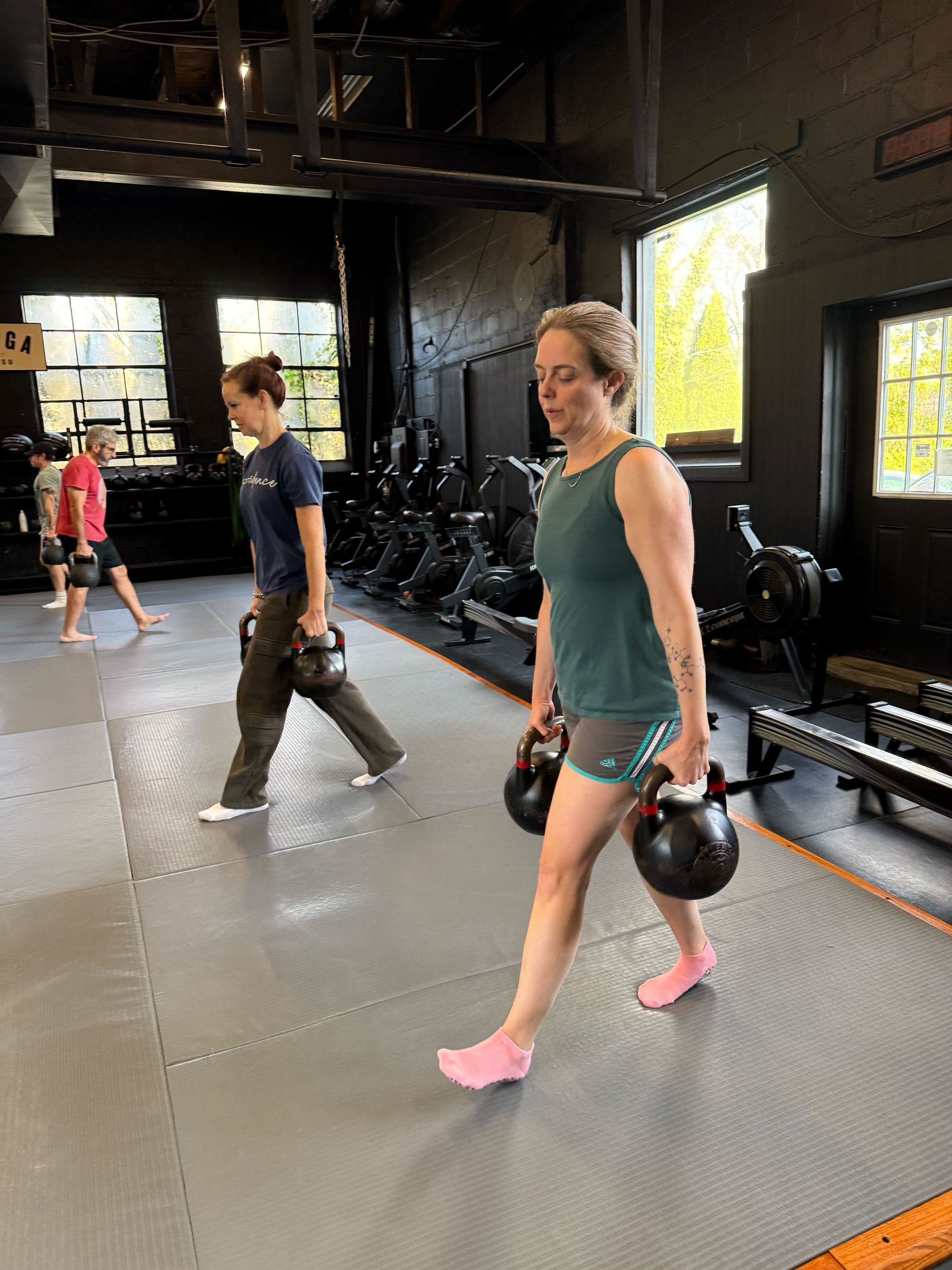 Members training in a coached group workout at Soma MVMT in Maplewood, NJ, building strength and stamina.