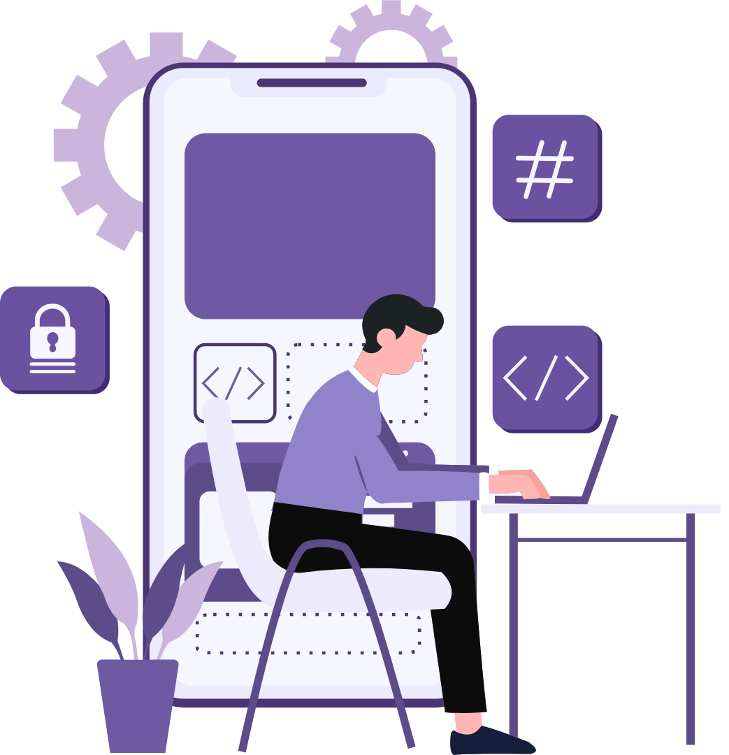 A man is sitting at a desk using a laptop computer.