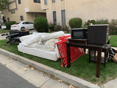 couch with old towel on it