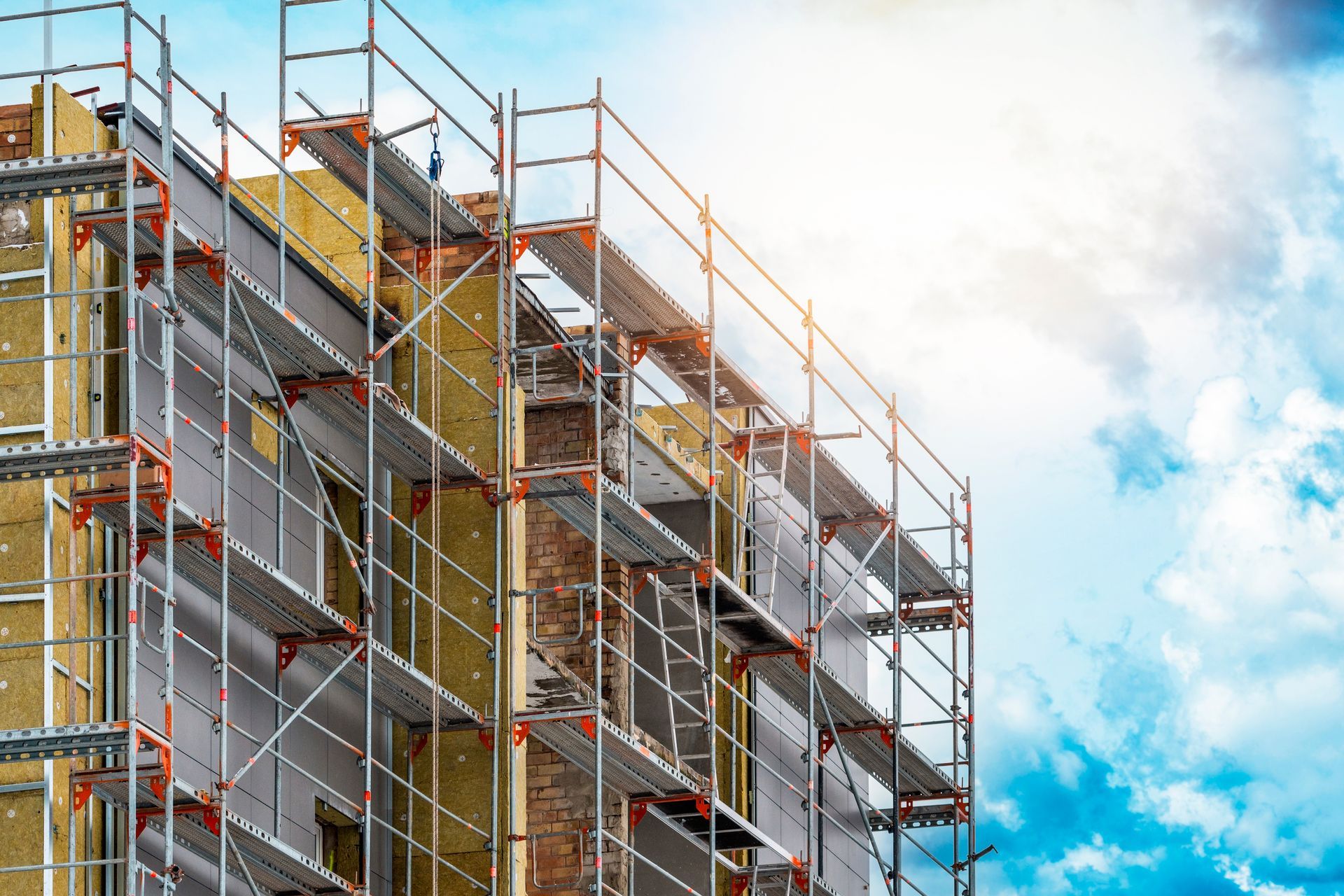 A building is being built with scaffolding around it.