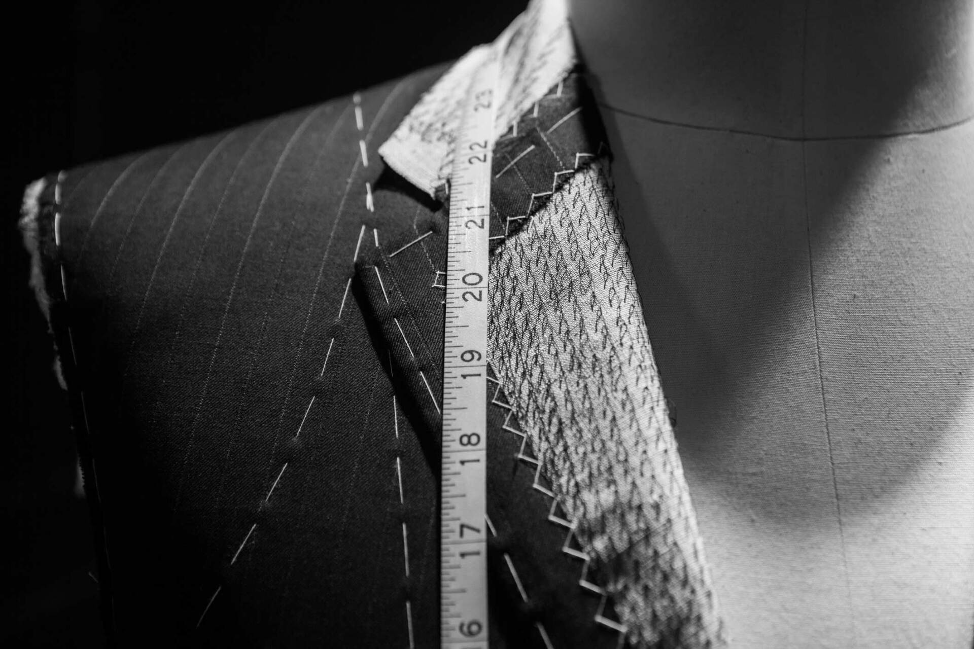 Close-up suit with a tape measure around neck | Wollongong, NSW | City Mode Leather