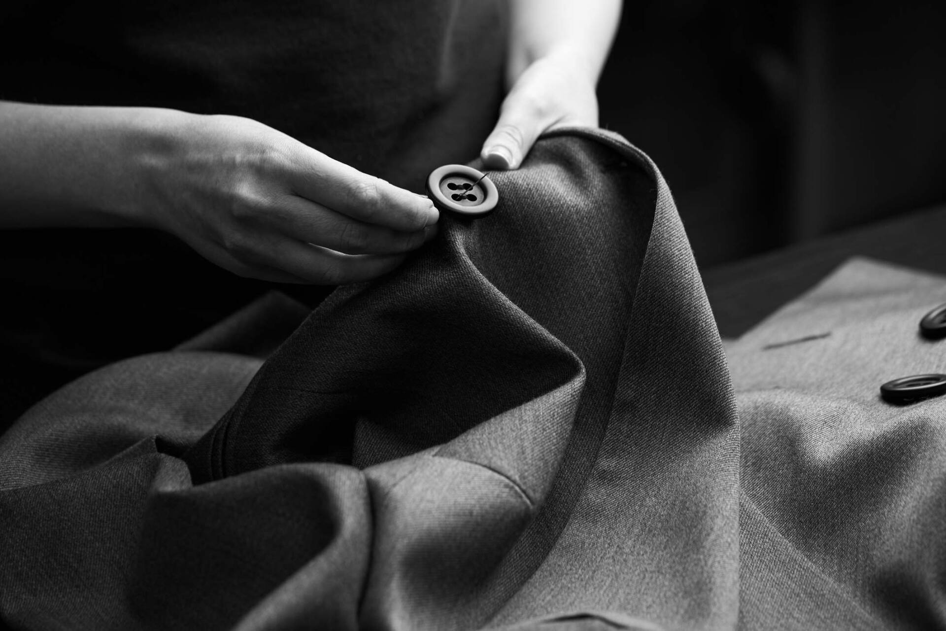 Sewing the buttons to the jacket | Wollongong, NSW | City Mode Leather