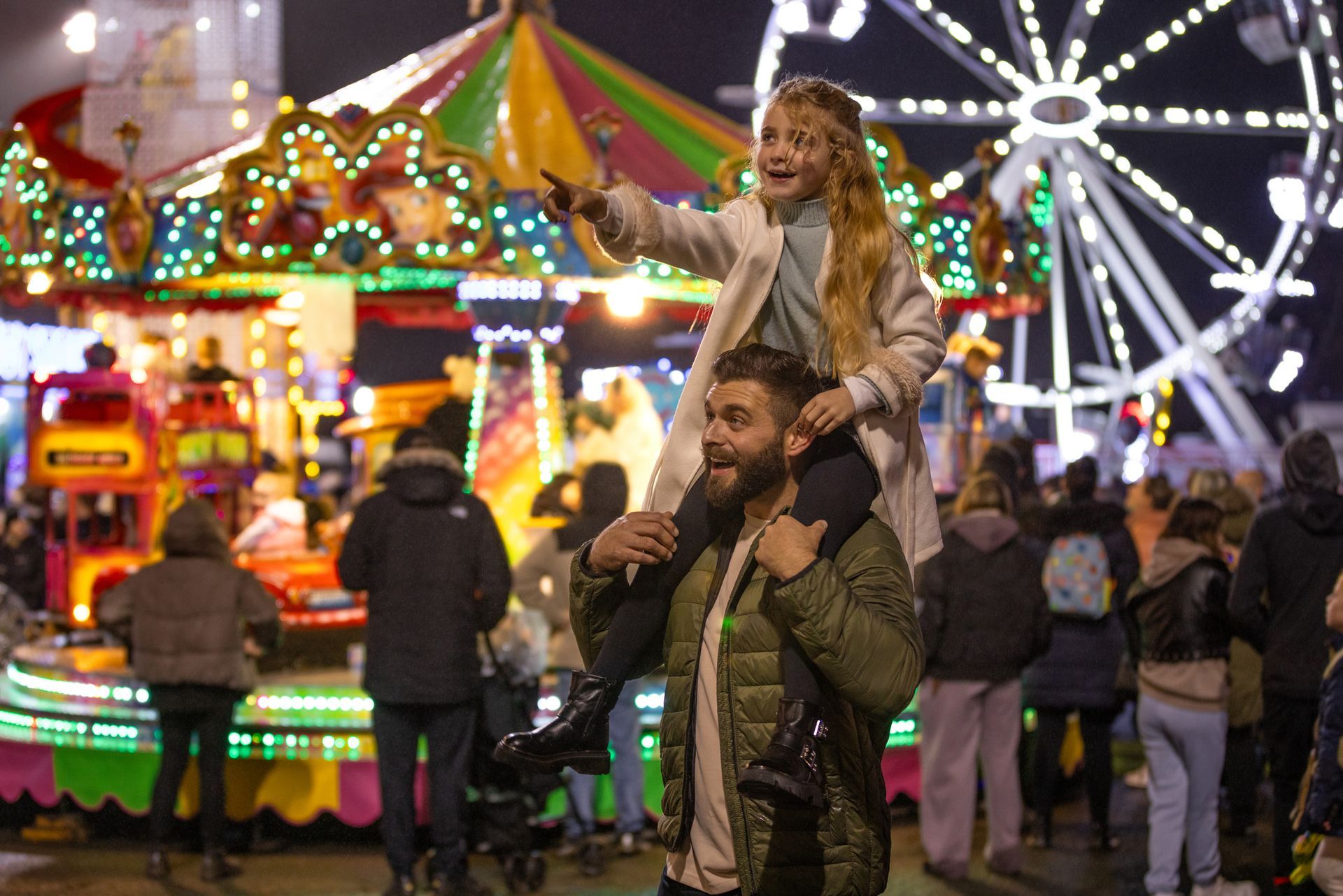Three blue portable toilets are sitting next to each other on a sidewalk.