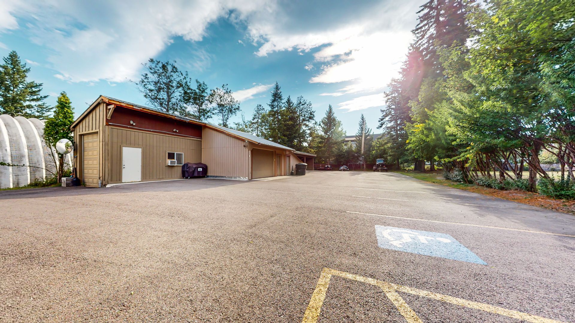 There is a handicapped parking spot in front of a building.