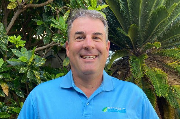 A yellow and red diagonal striped background with black text reading 