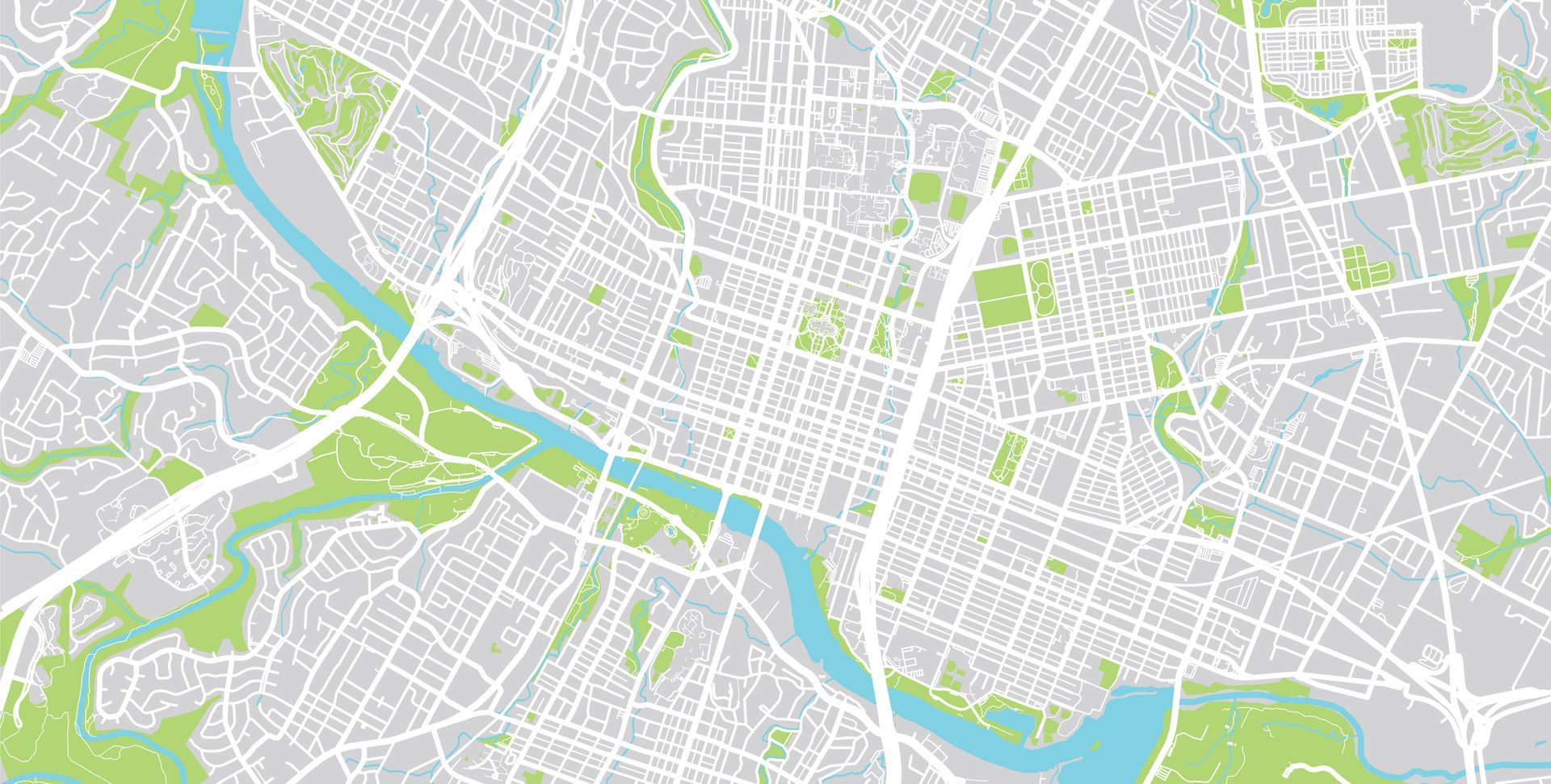 A map of a city with a river and parks.