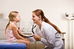 Doctor Smiling to a Patient – Chester, SC – Mante Pediatrics