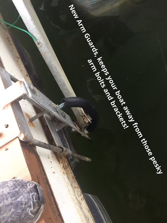 Arm guard installed on a boat, text says, 