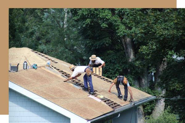 roofers working on roof
