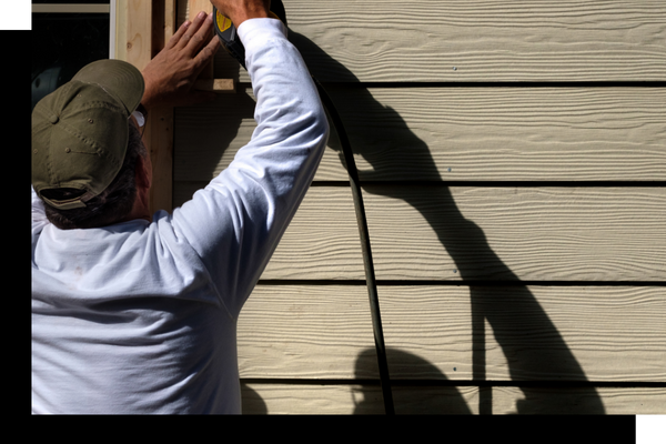 A man working on a roof.