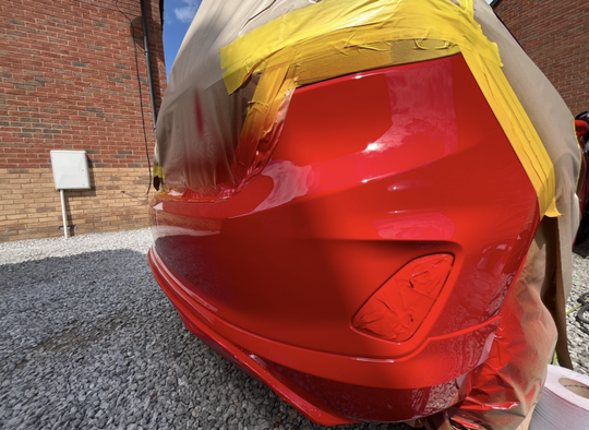 Bumper Scuff Repaired  Back To New
