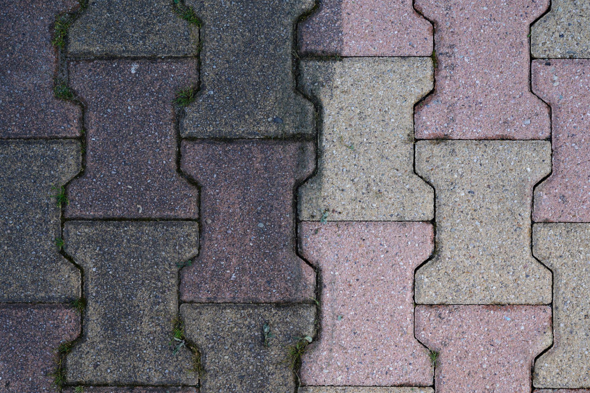 before and after of pressure washing concrete pavers