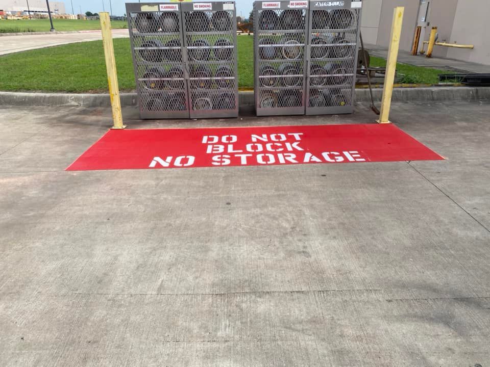 A do not block no storage sign is painted on the ground