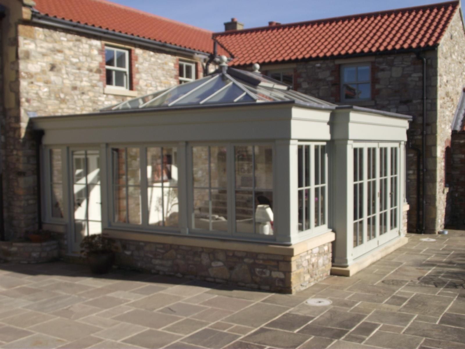 A large building with a roof that is red