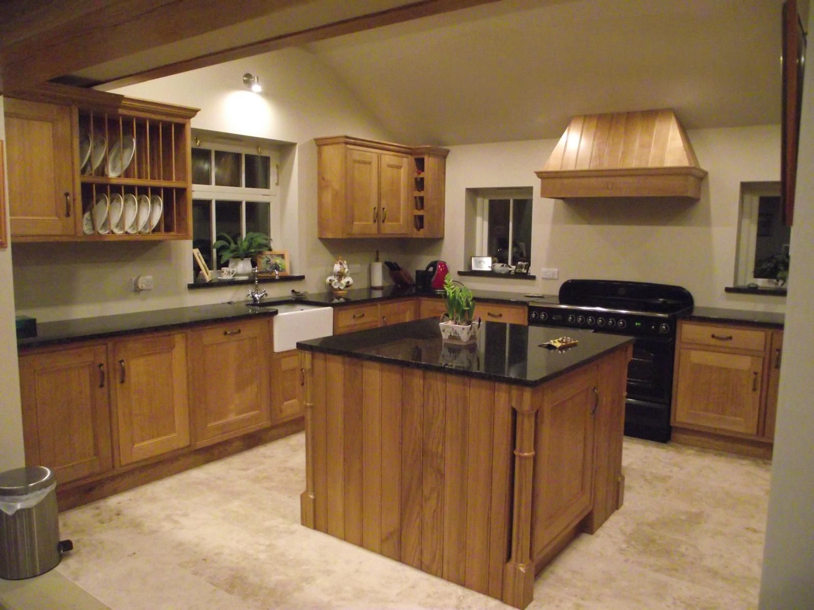 A kitchen with a large island in the middle