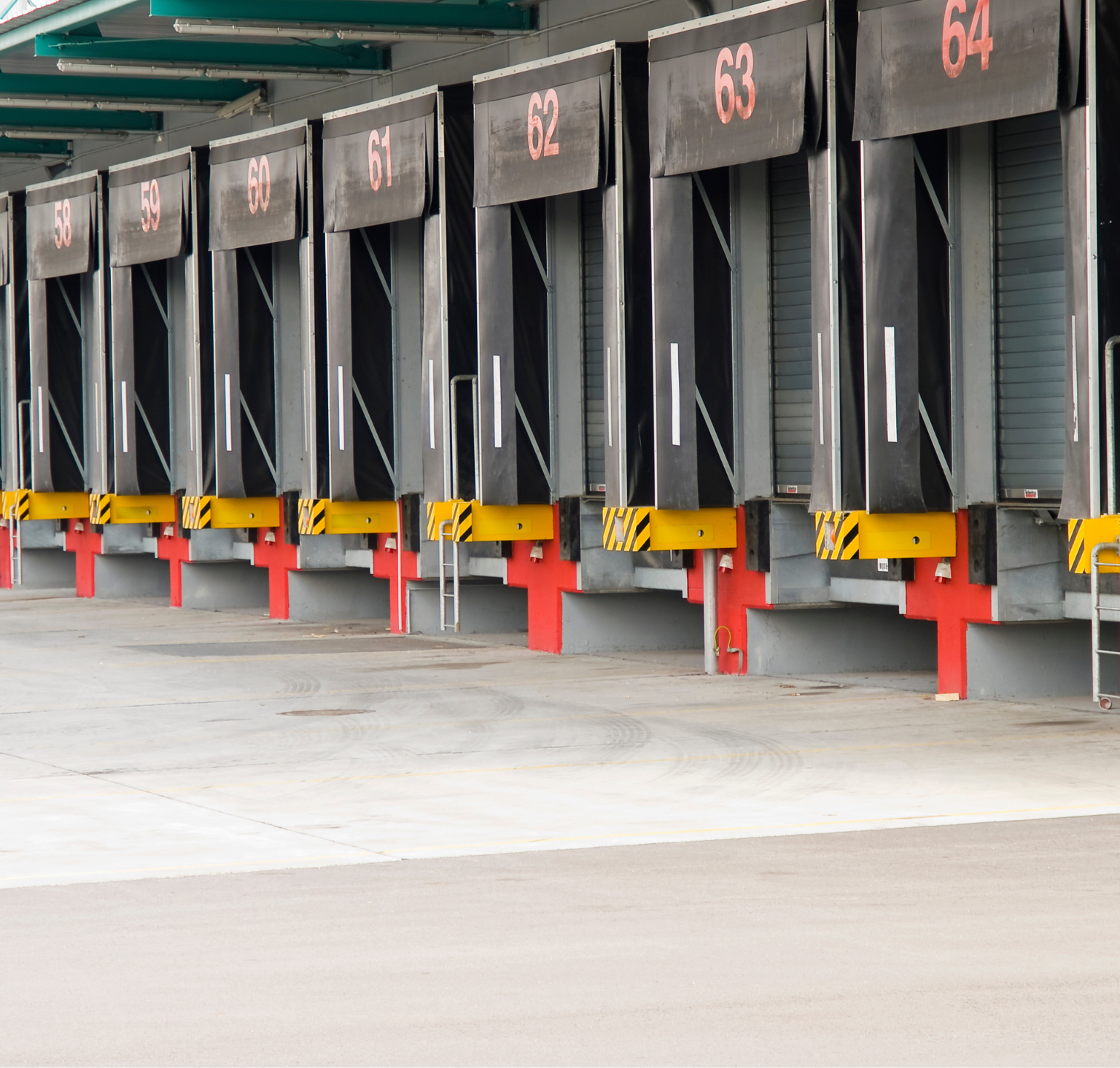 A row of loading docks with the numbers 63 and 64 on them