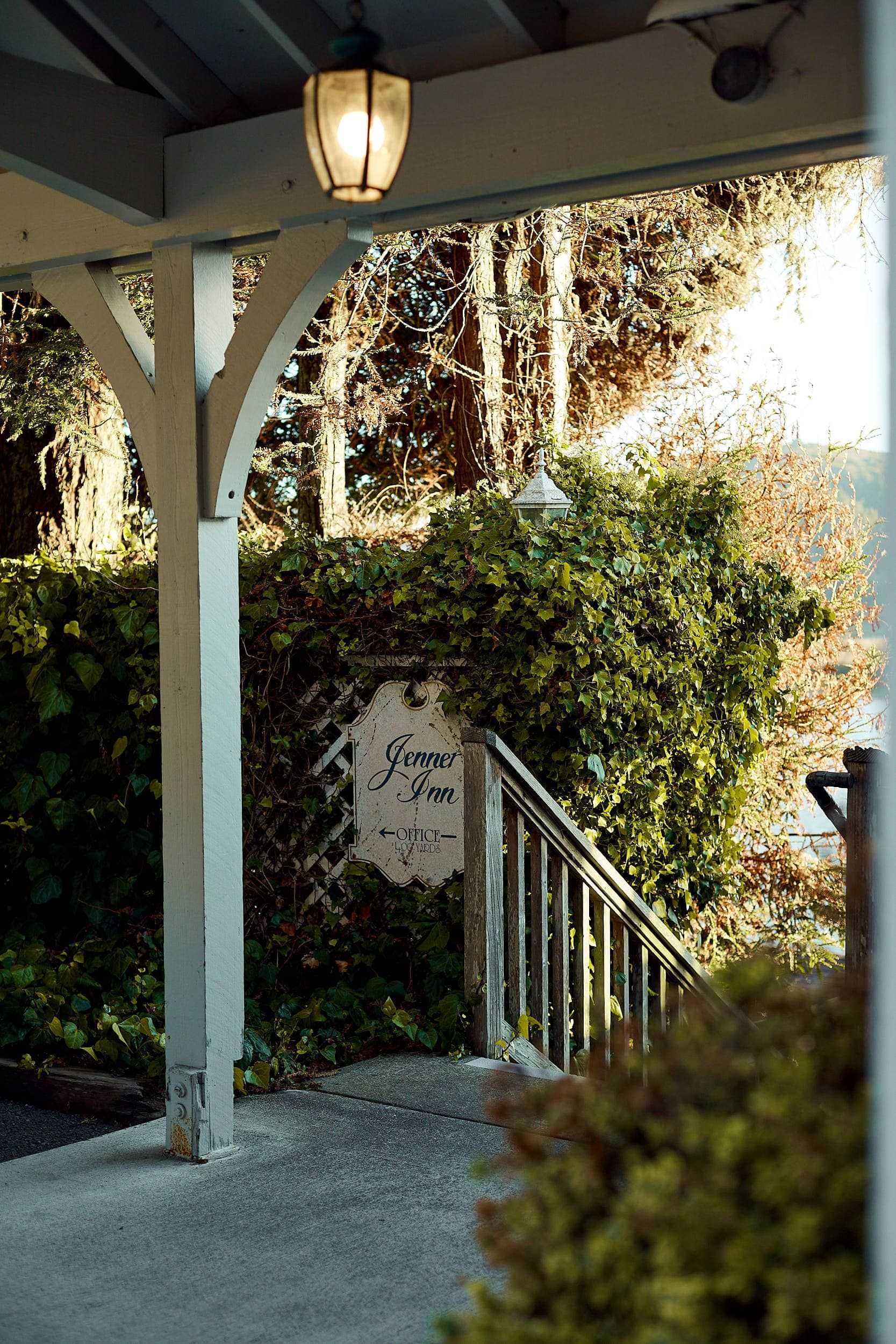 Covered porch entrance with sign for