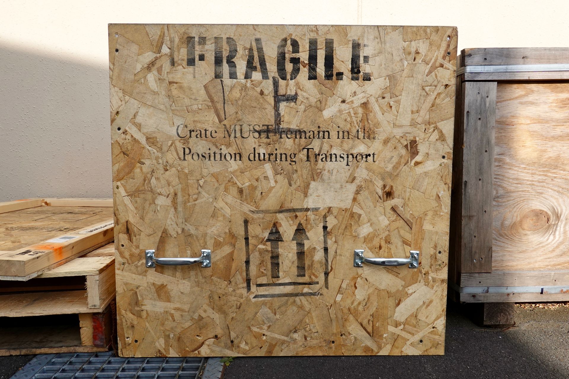A wooden box with the word fragile on it