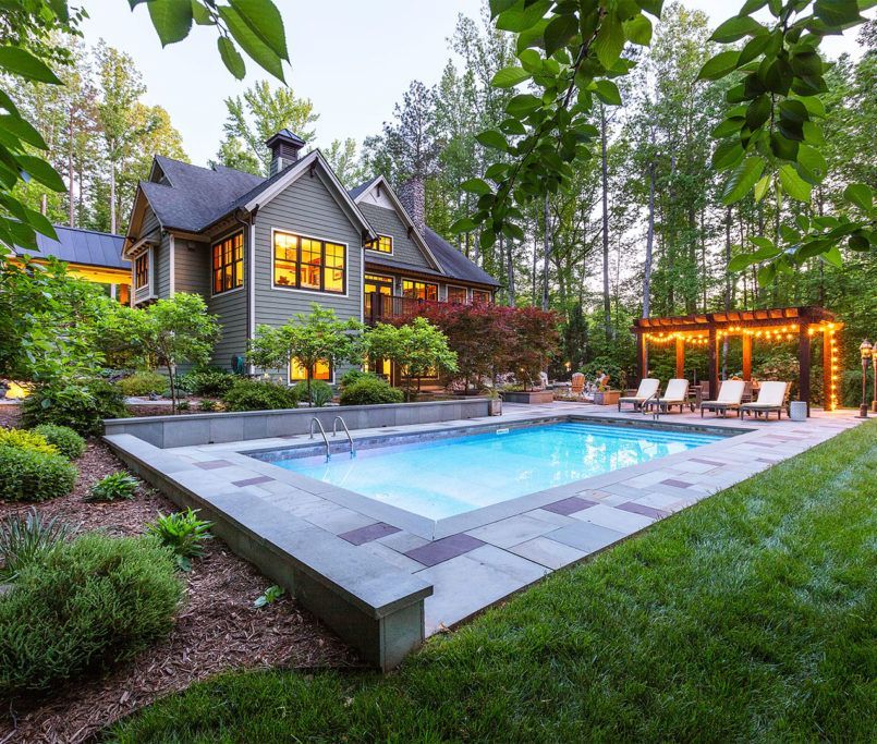 backyard pool and lush garden