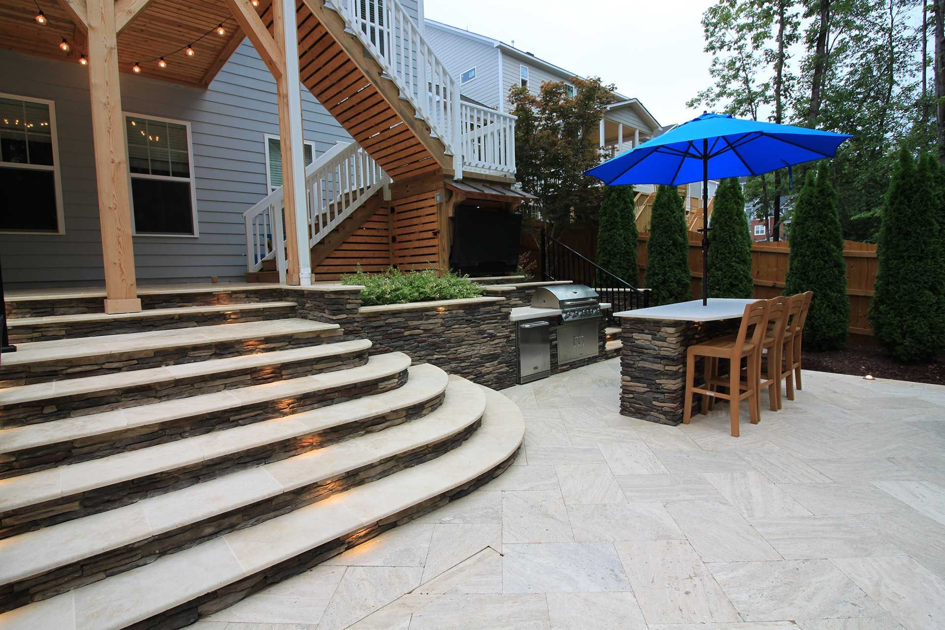 Outdoor patio with curved stone steps