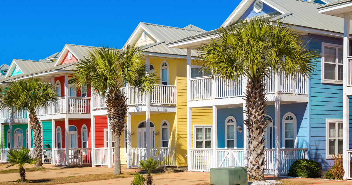 A modern house with a swimming pool and a lot of windows.