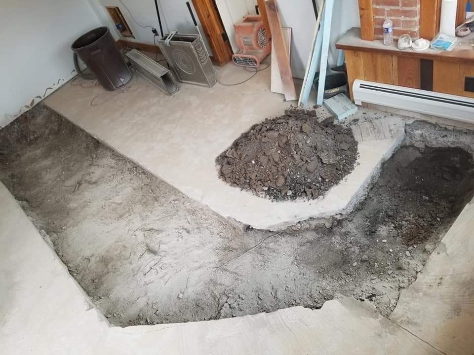 a pile of dirt is in the middle of a room