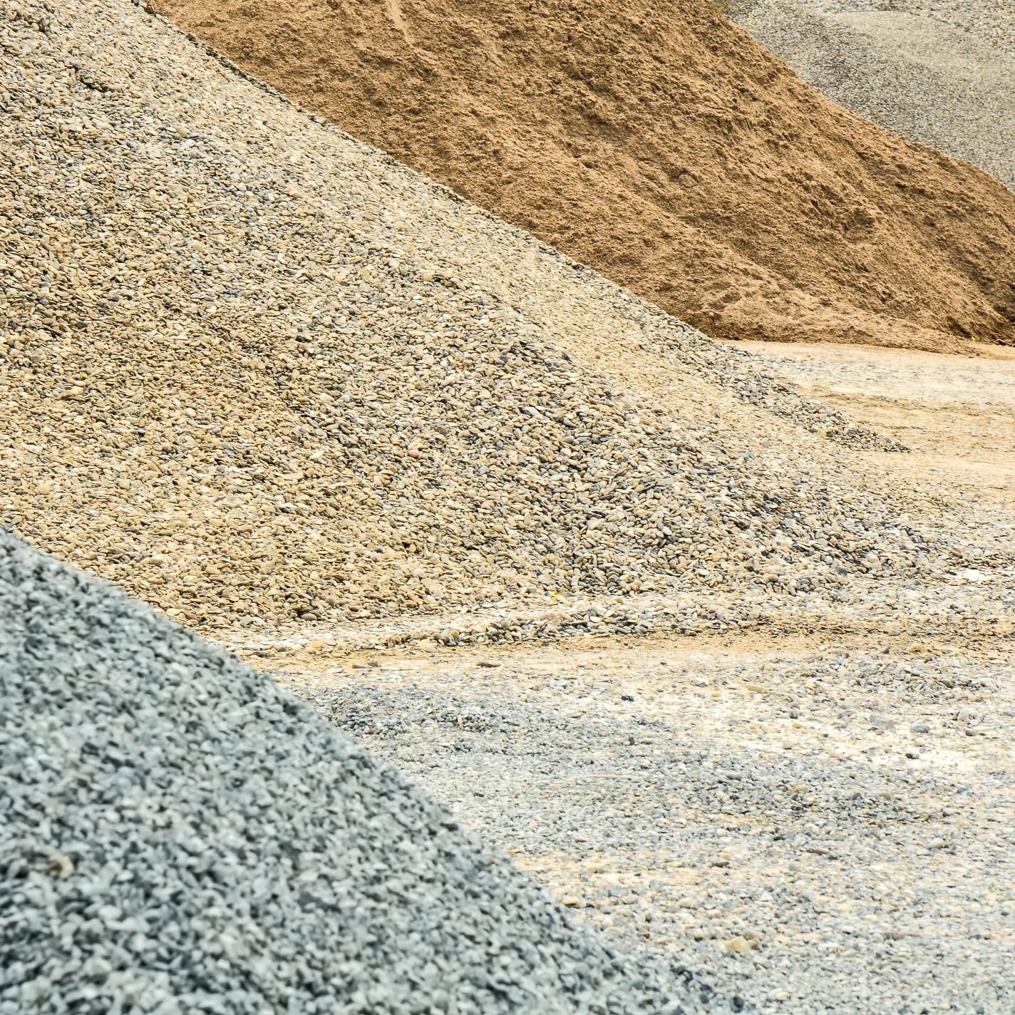 There are many different types of gravel in this pile.
