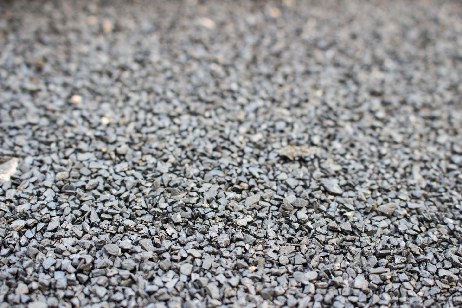 A close up of a pile of gravel on the ground