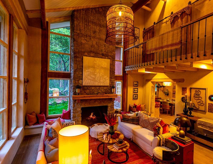 A living room filled with furniture and a fireplace