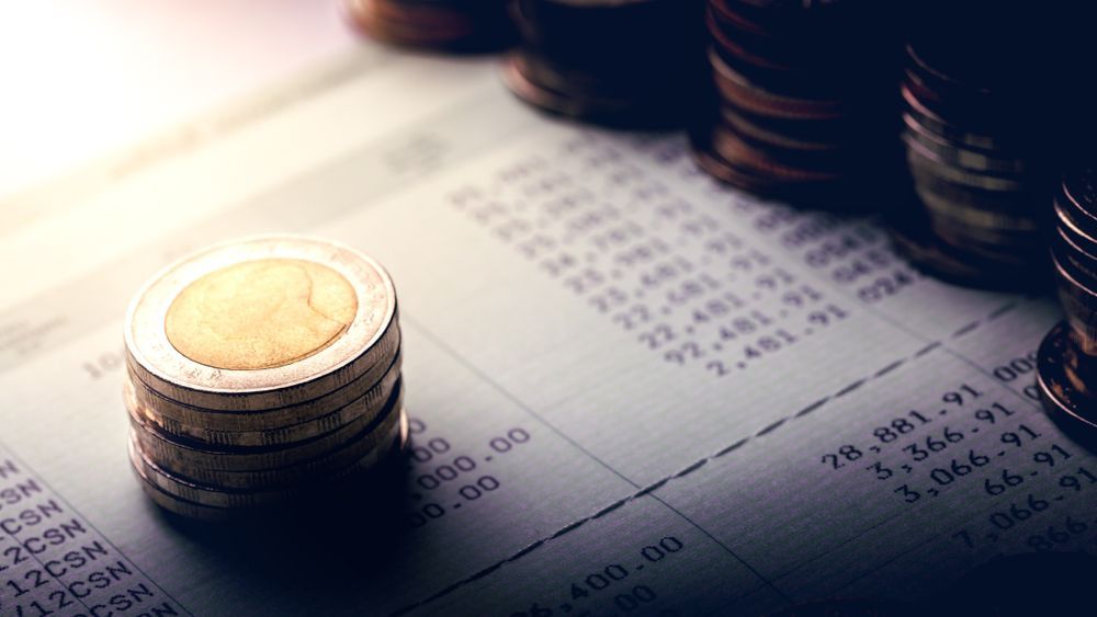 Stacks of Coins on a Bank Statement, Financial Concept — Midcoast Financial Planning Group in Taree, NSW