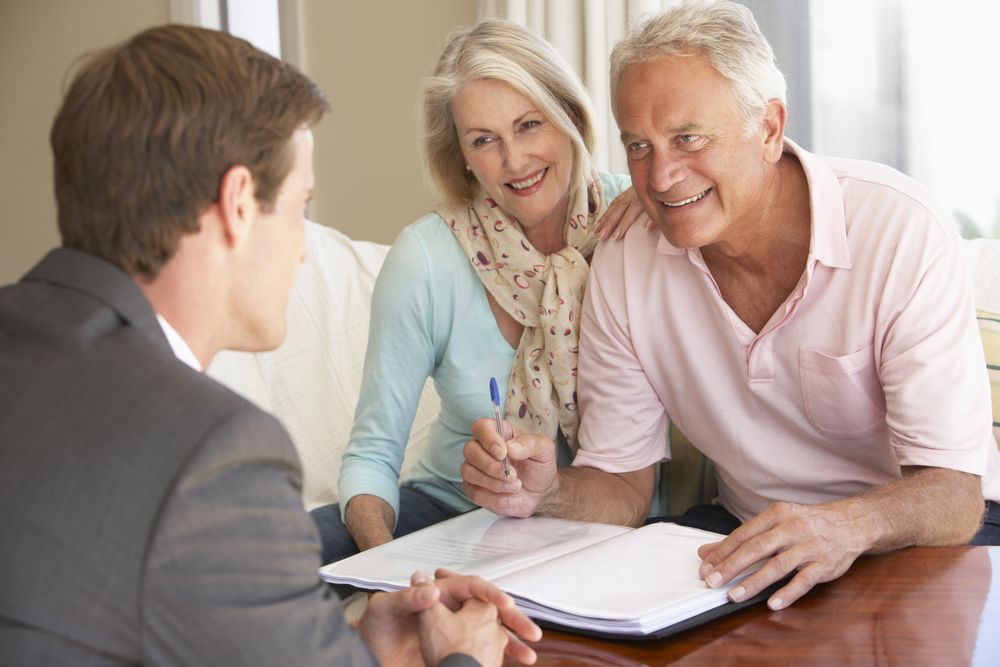 A Financial Advisor Reviewing Documents — Midcoast Financial Planning Group in Tuncurry, NSW