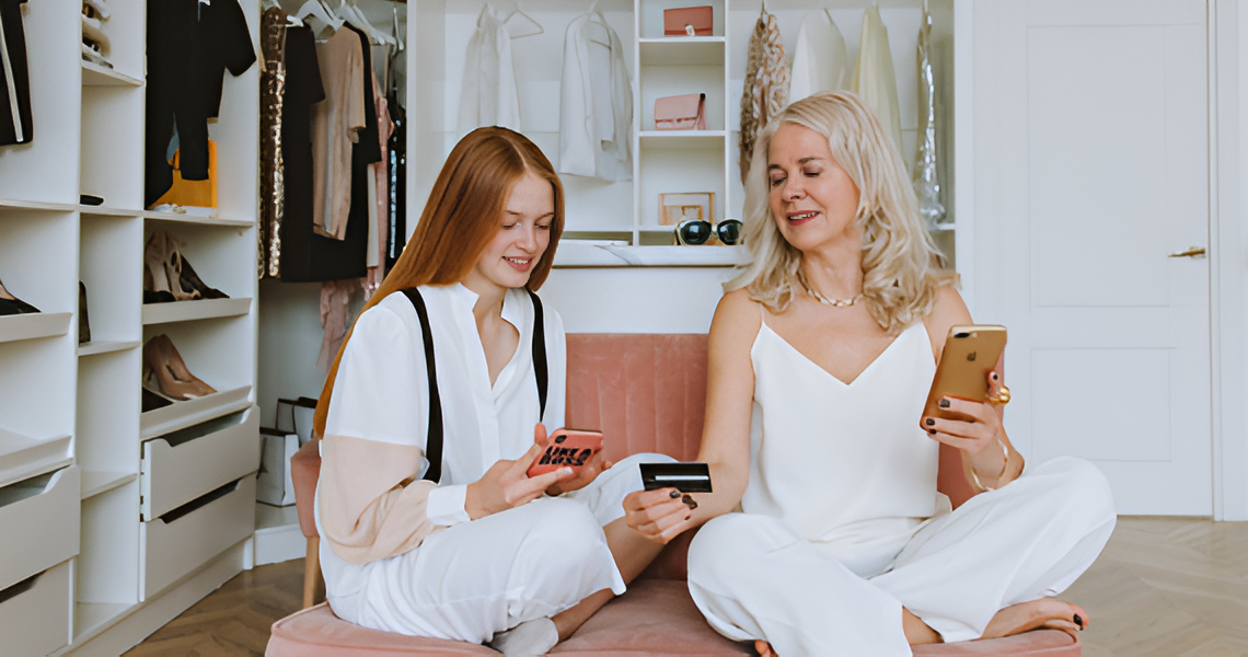 Two People Using Credit Cards — Midcoast Financial Planning Group in Tuncurry, NSW