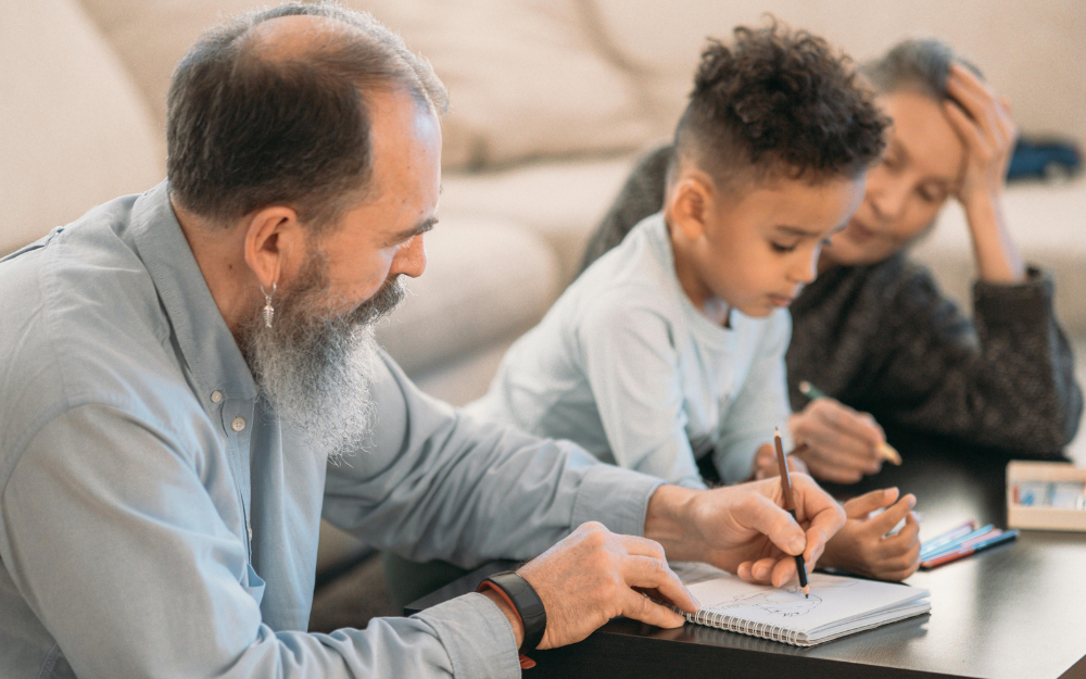 Grandfather, Child, and Grandmother Drawing — Midcoast Financial Planning Group in Tuncurry, NSW