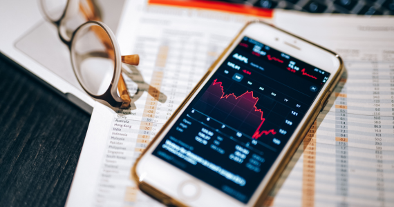 Smartphone Displaying A Stock Market Graph — Midcoast Financial Planning Group in Tuncurry, NSW