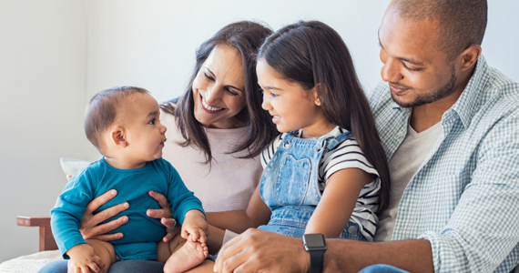 Family of Four Smiles, Including a Baby — Midcoast Financial Planning Group in Tuncurry, NSW