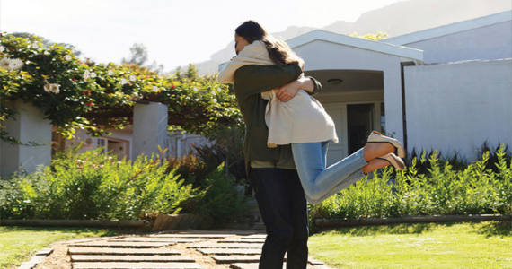 Man Lifting And Embracing A Person — Midcoast Financial Planning Group in Tuncurry, NSW