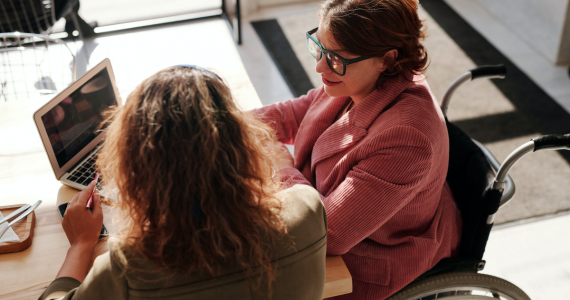 Woman in Wheelchair at A Table — Midcoast Financial Planning Group in Tuncurry, NSW