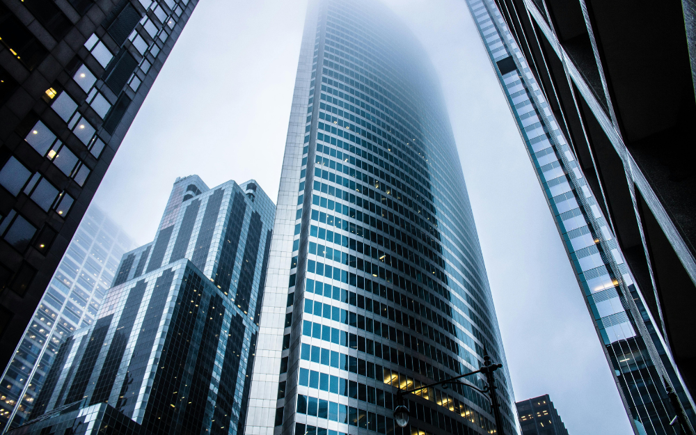 Tall Skyscraper Shrouded in Fog — Midcoast Financial Planning Group in Tuncurry, NSW