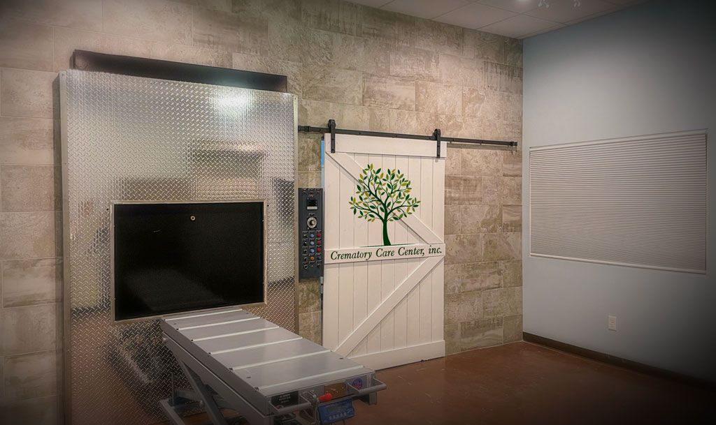 Indoor crematory with tile wall and sliding barn door