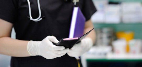 Lab tech with phone - Drug testing in Little Falls, MN Lab tech with phone - Drug testing in Little Falls, MN