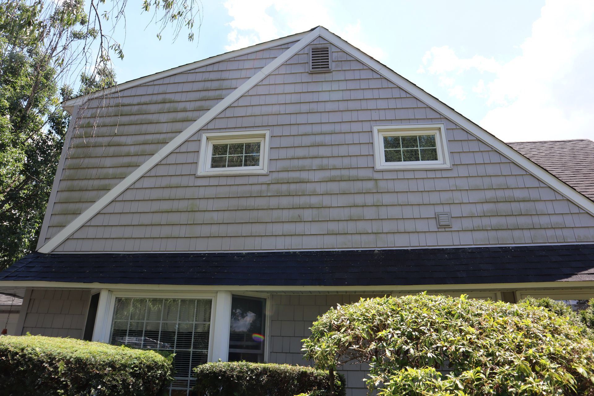 A house with a before power washing