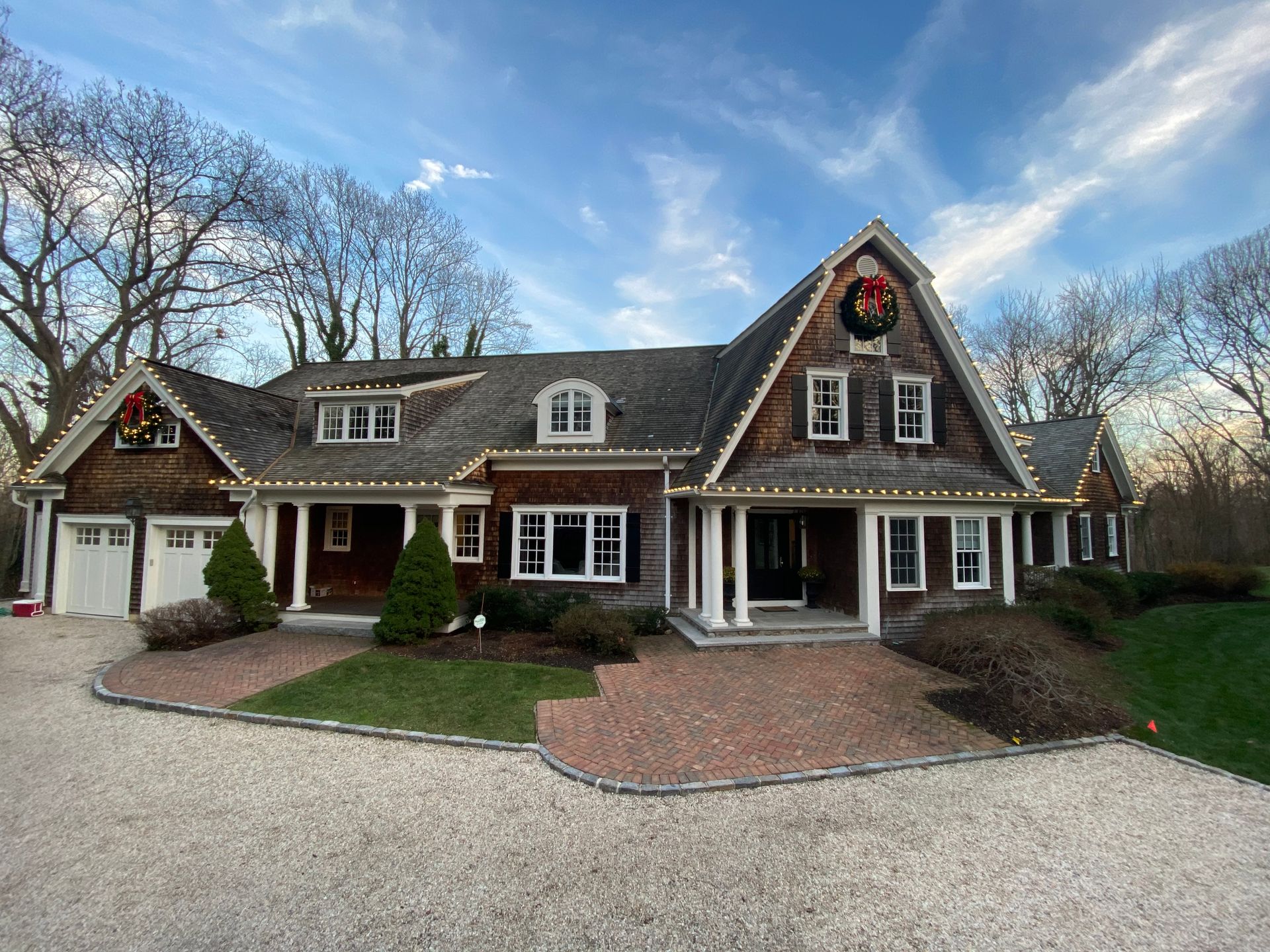 A large house with a wreath on the front of it