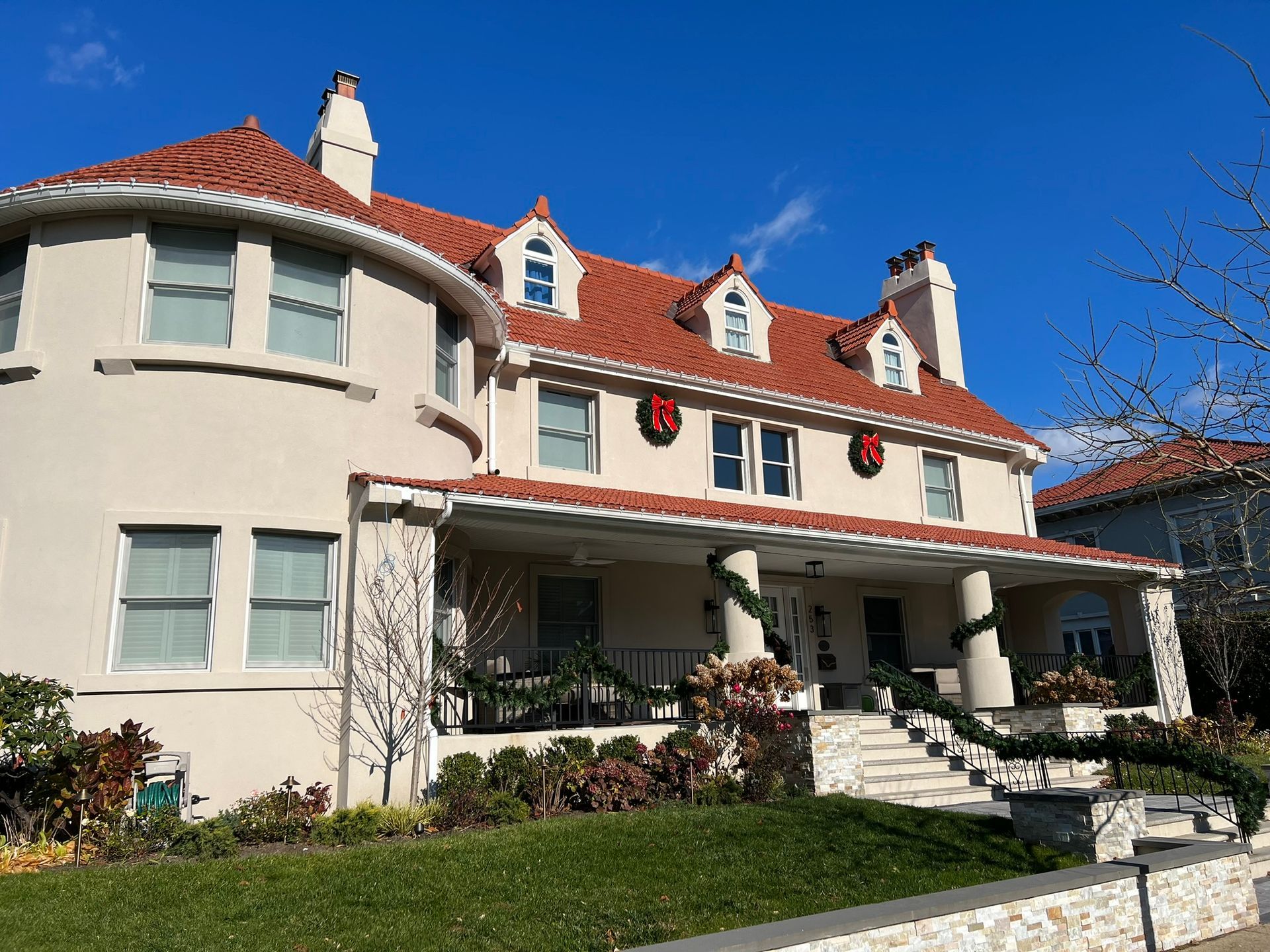 Big house with professional holiday lights installations