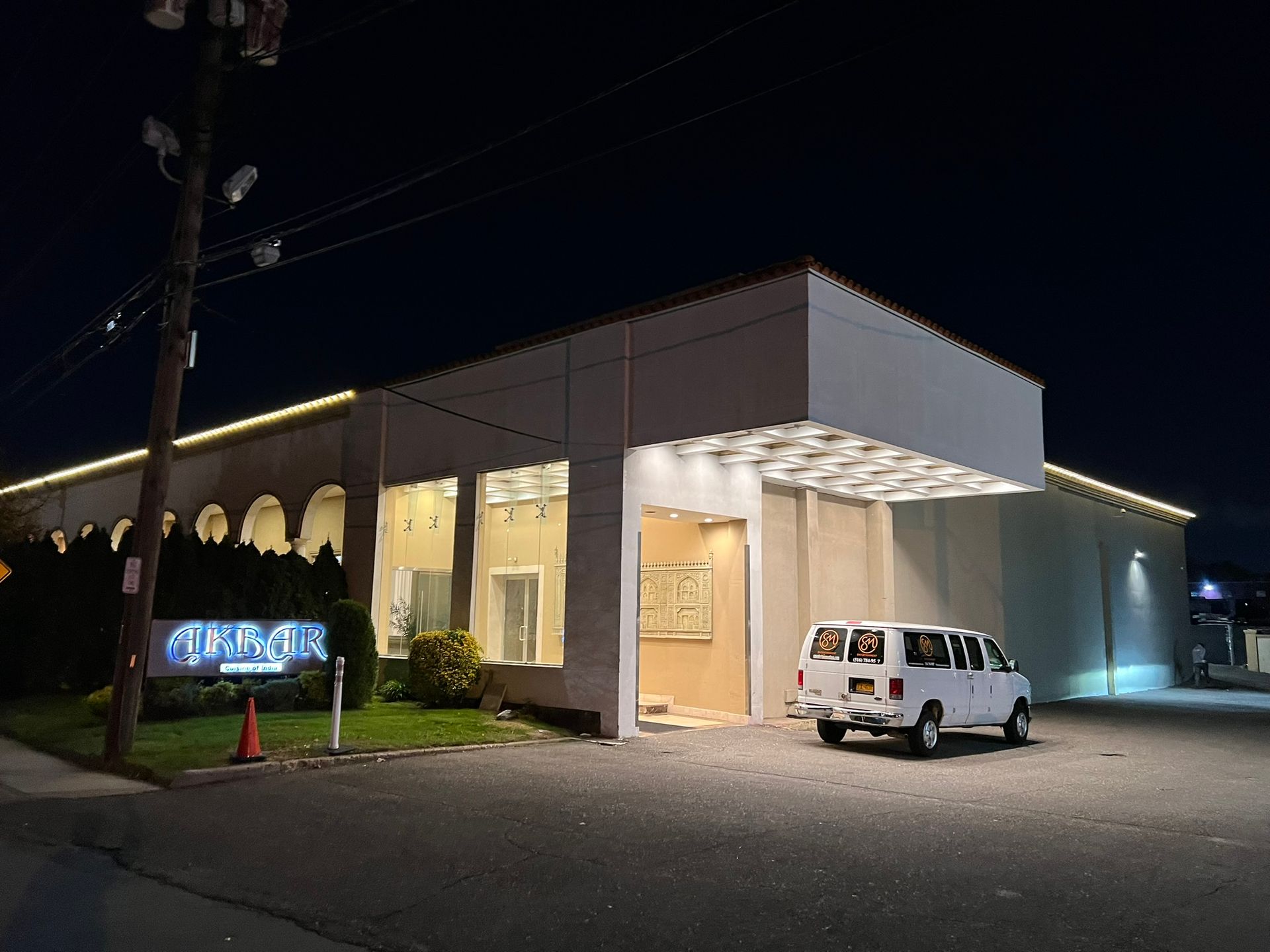 Elegant home exterior with warm white lights
