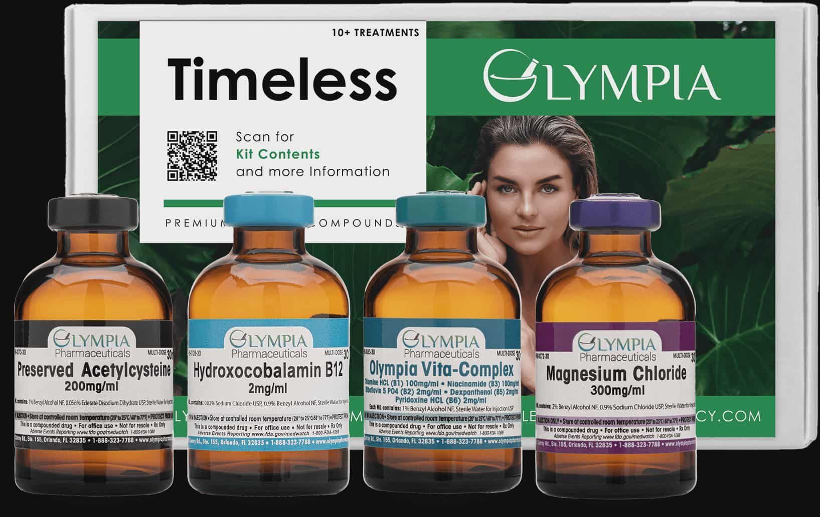 Woman in green patterned outfit stands in front of a blue desk. 