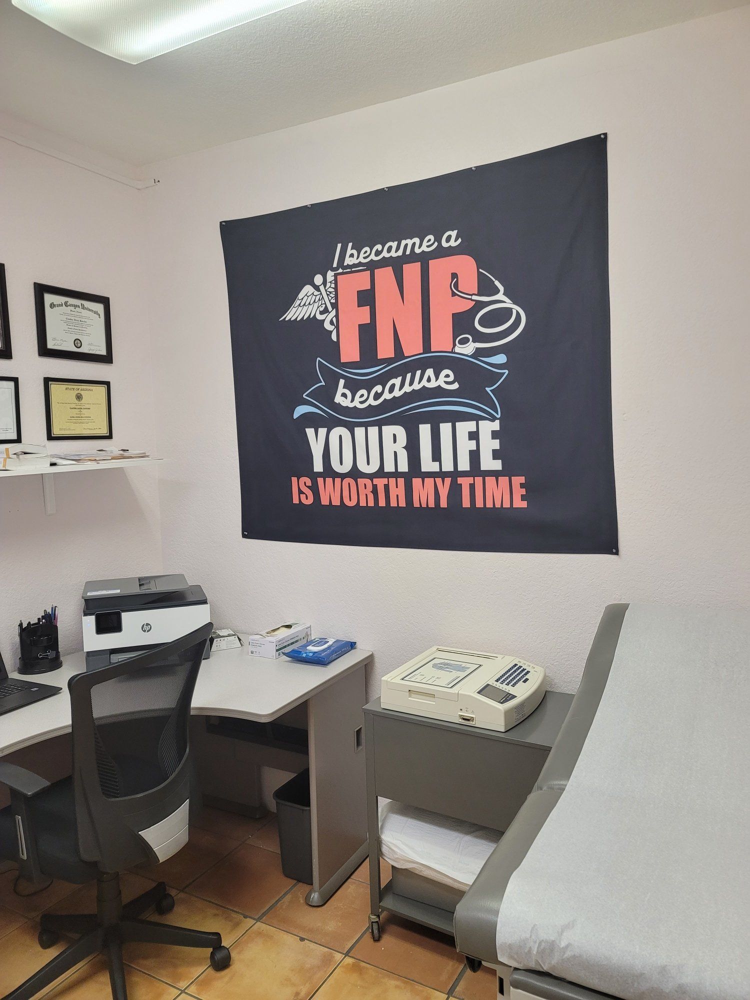 A doctor 's office with a sign that says `` i became a fnp because your life is worth my time ''