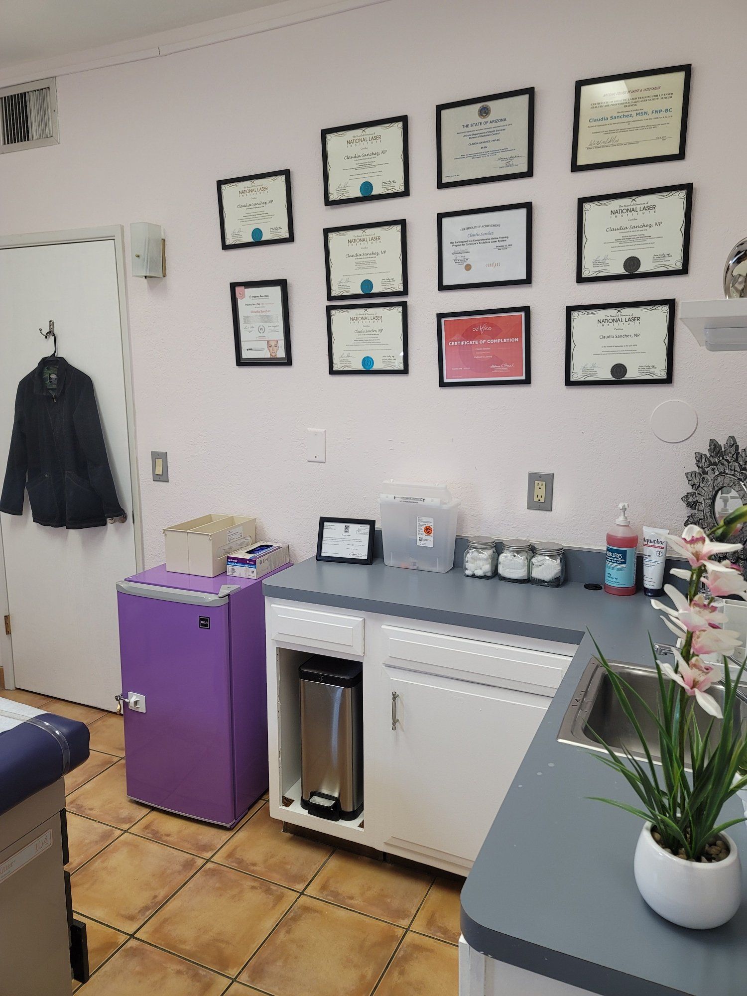 There are many certificates on the wall in this room.