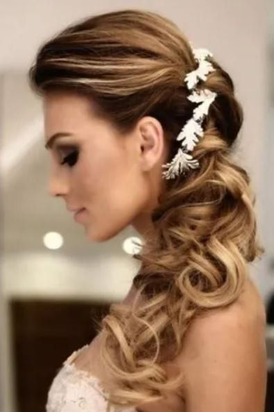 Acconciatura sposa per capelli lunghi
