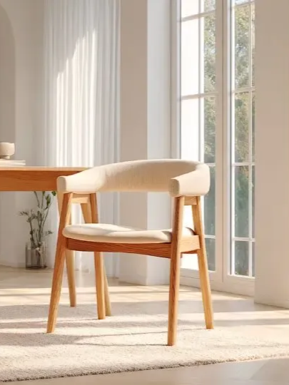A wicker patio set with chairs and a table